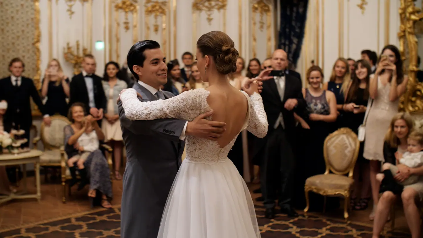 Bride and groom smiling during their first dance